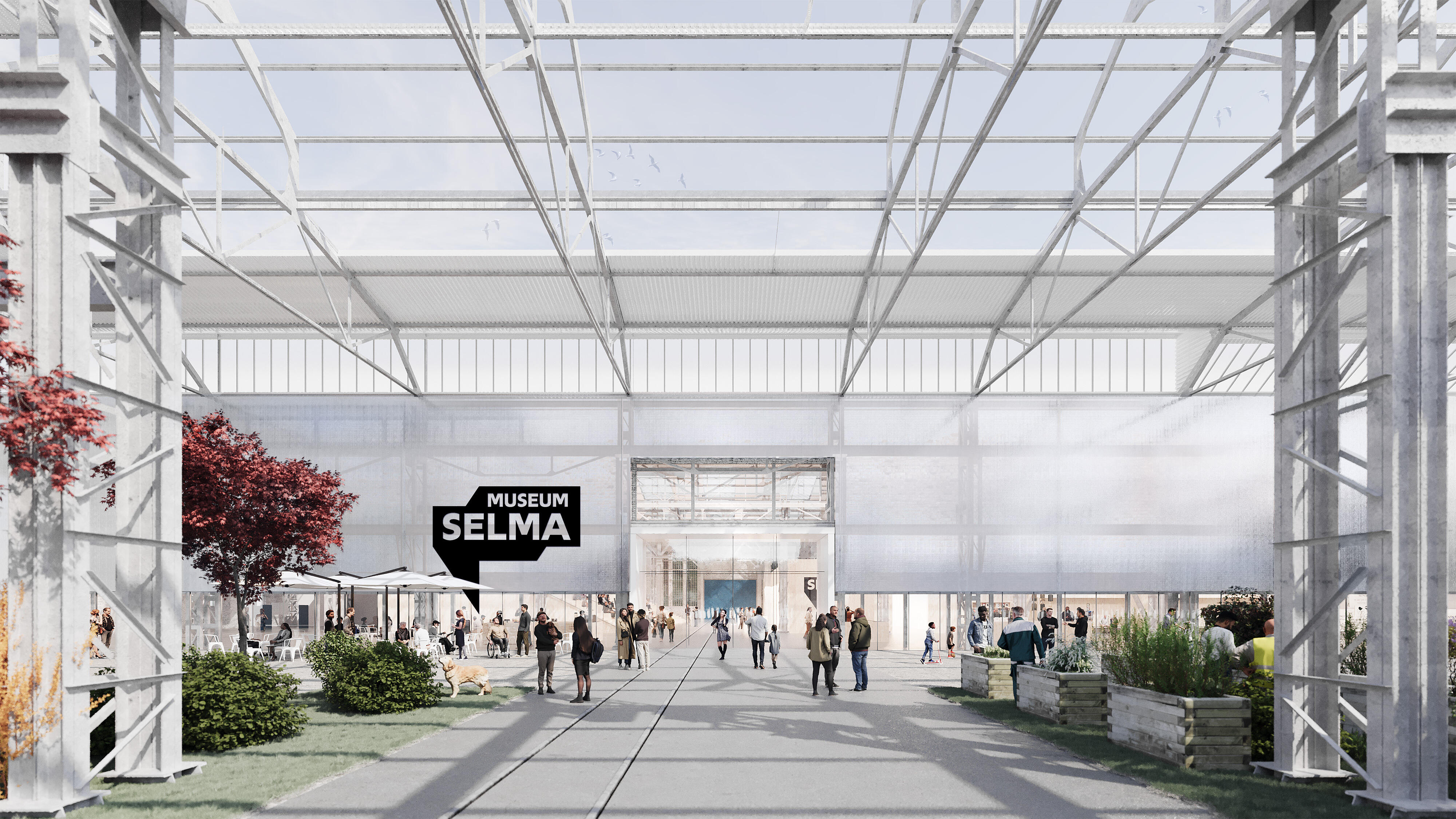 The uncovered neighbouring hall can be seen, through which visitors can enter the museum. The old steel frame remains standing. The entrance area of the museum can be accessed along old rails on the floor.