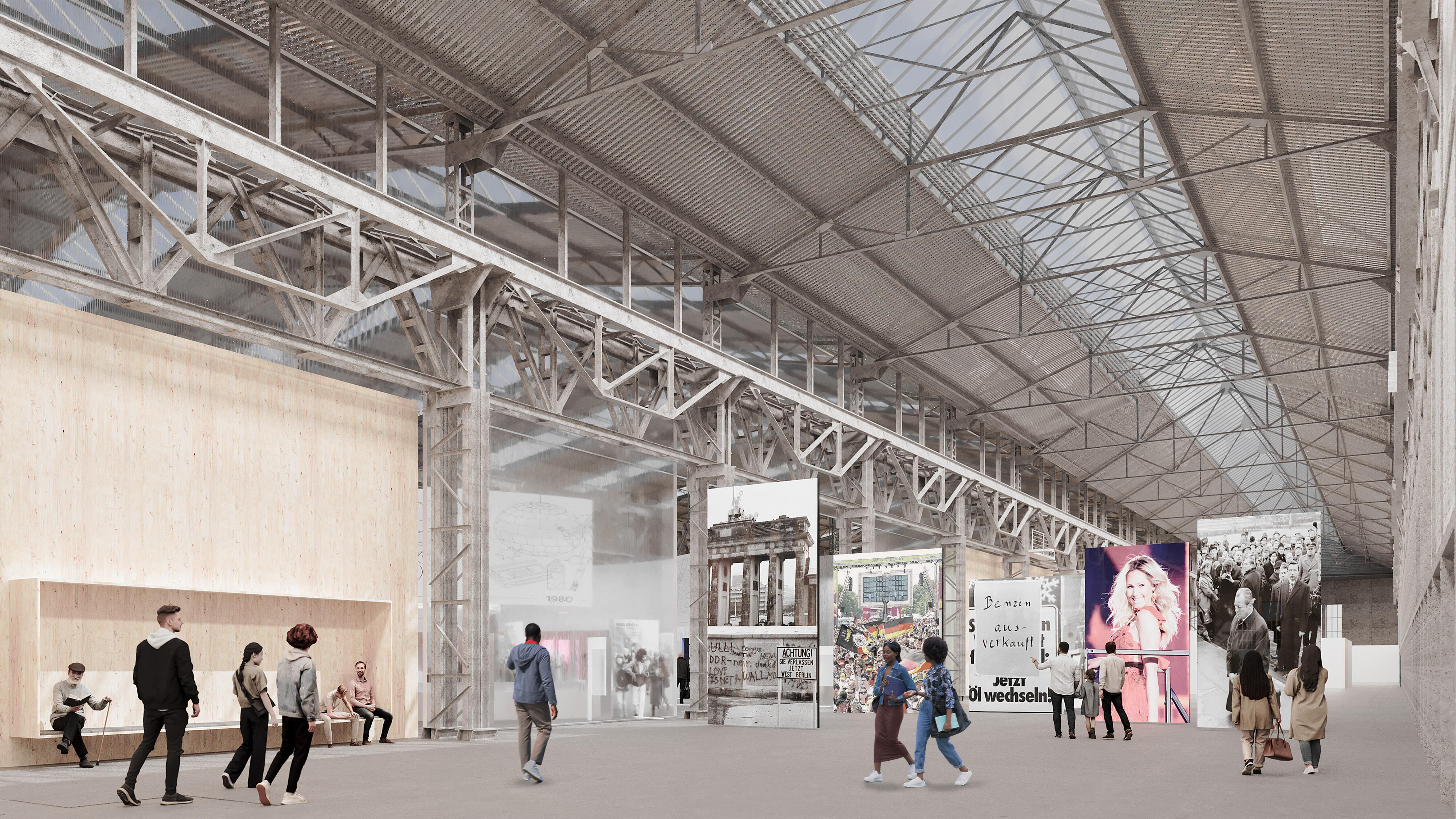 The entrance to the permanent exhibition at Museum Selma can be seen. The side aisle of the museum hall with its steel supporting structure and light-coloured roof is clearly visible. People walk past large panels depicting moments in German history.